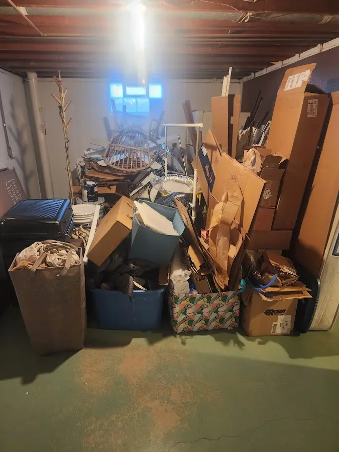 Roll-off dumpster container at job site for 6 Yard Dumpster Rental in Blooming Grove